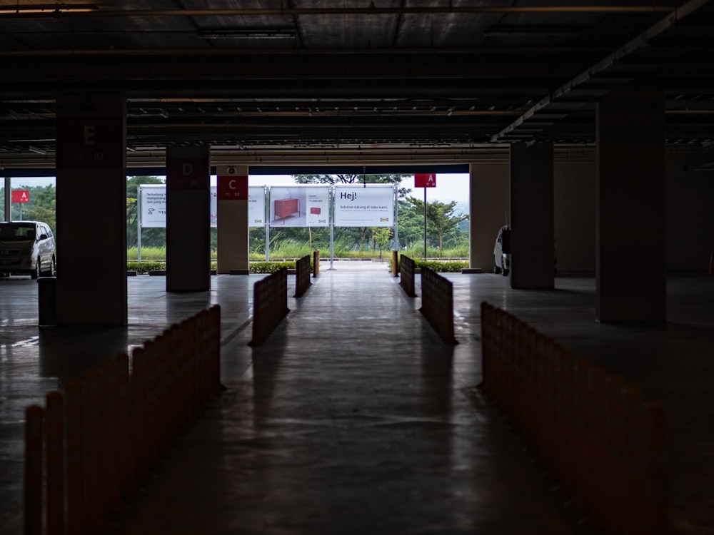 an empty parking garage with a truck parked in it