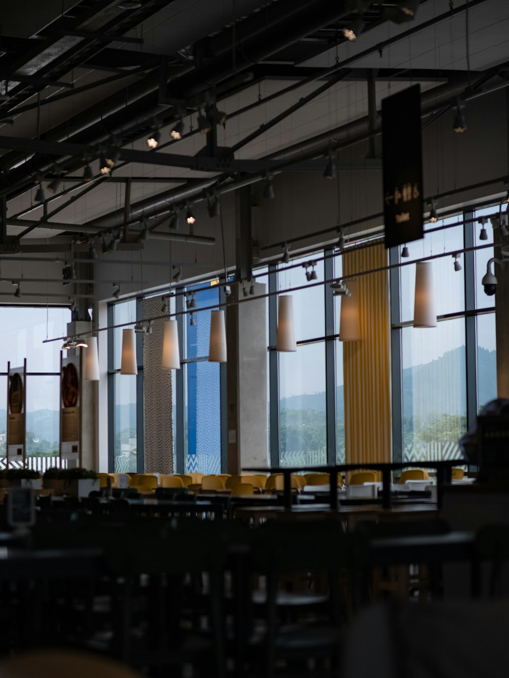 a restaurant with a view of the mountains