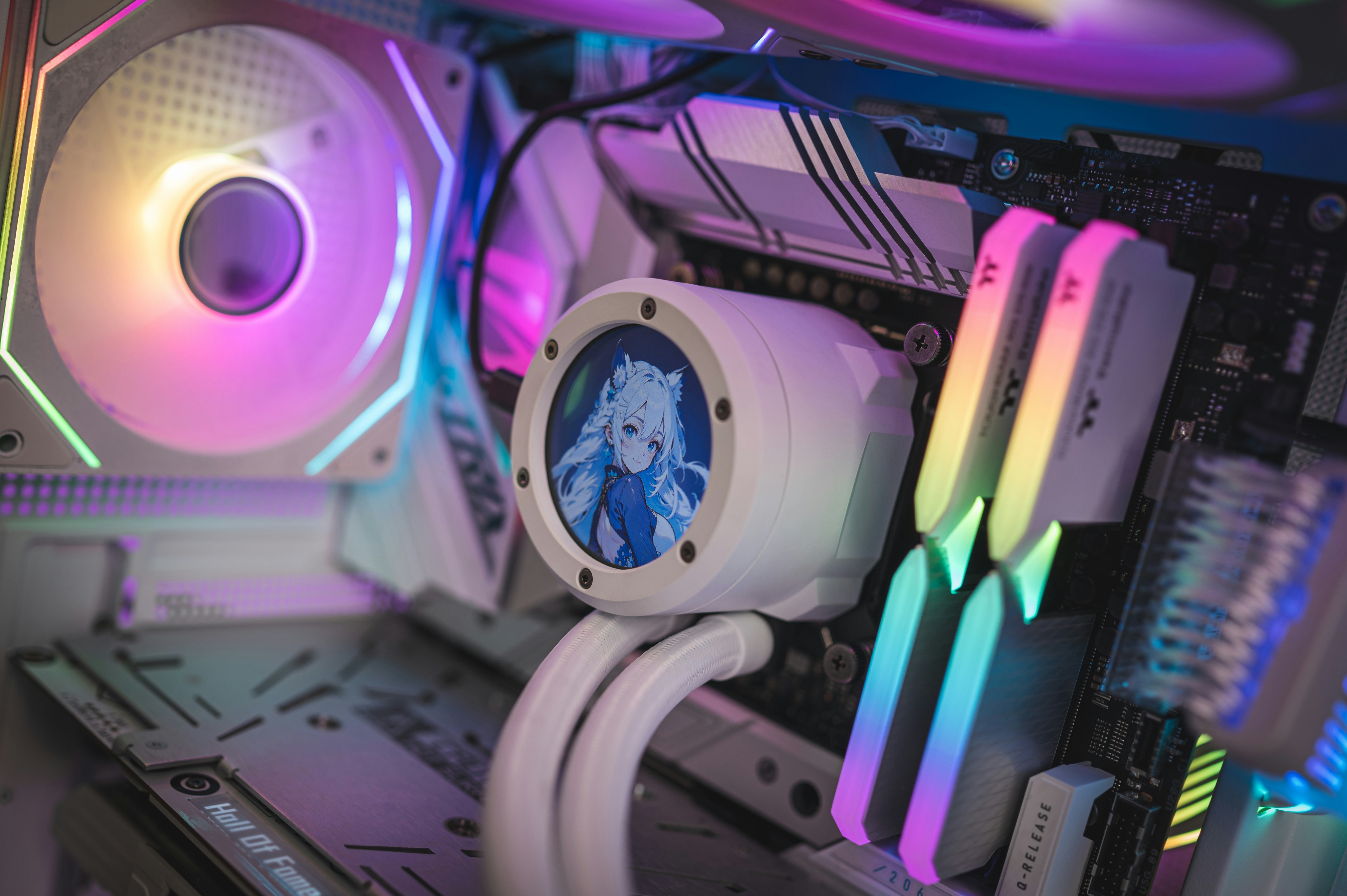 um close up de uma placa-mãe de computador com luzes coloridas