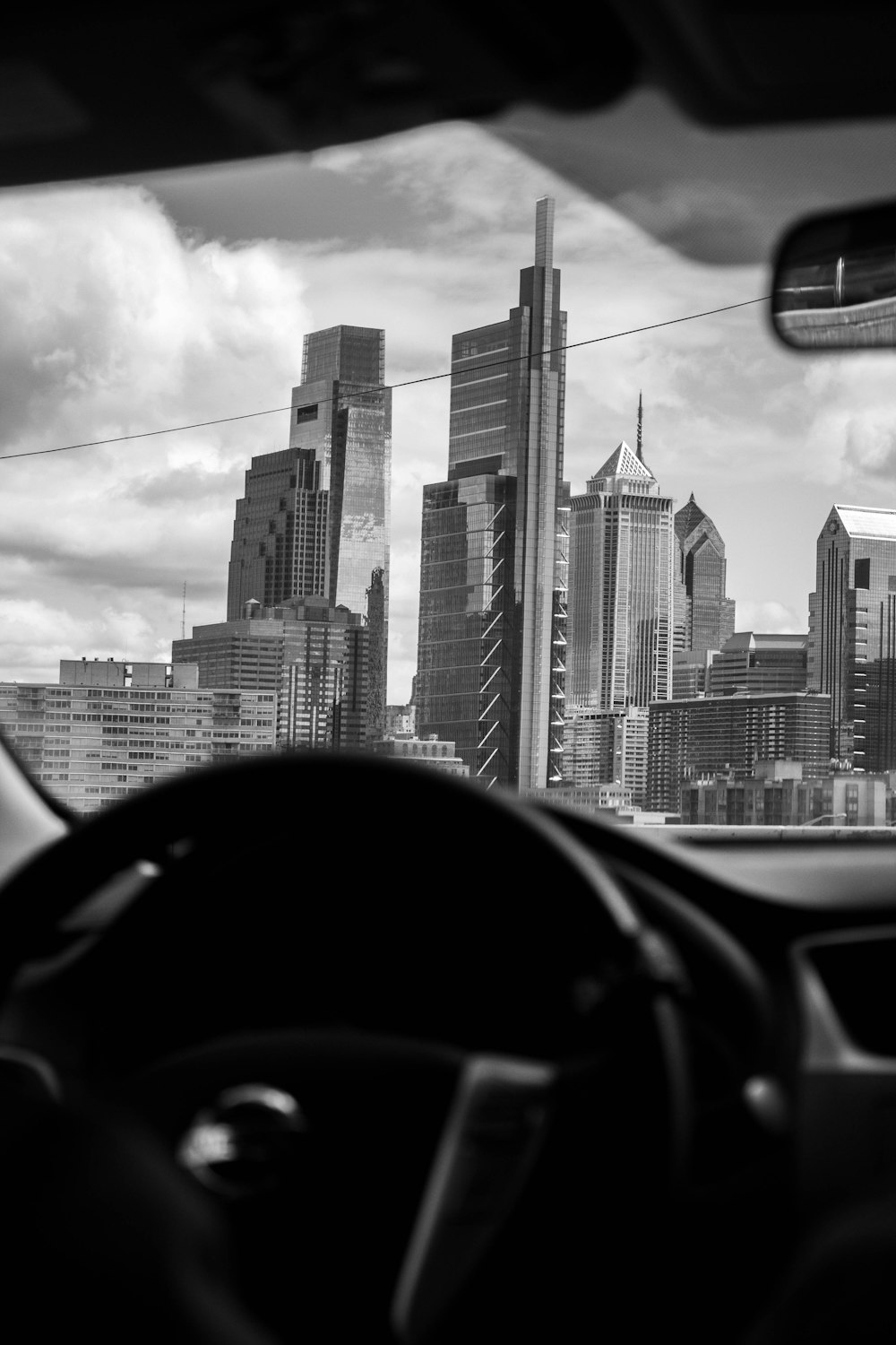 a view of a city from inside a car