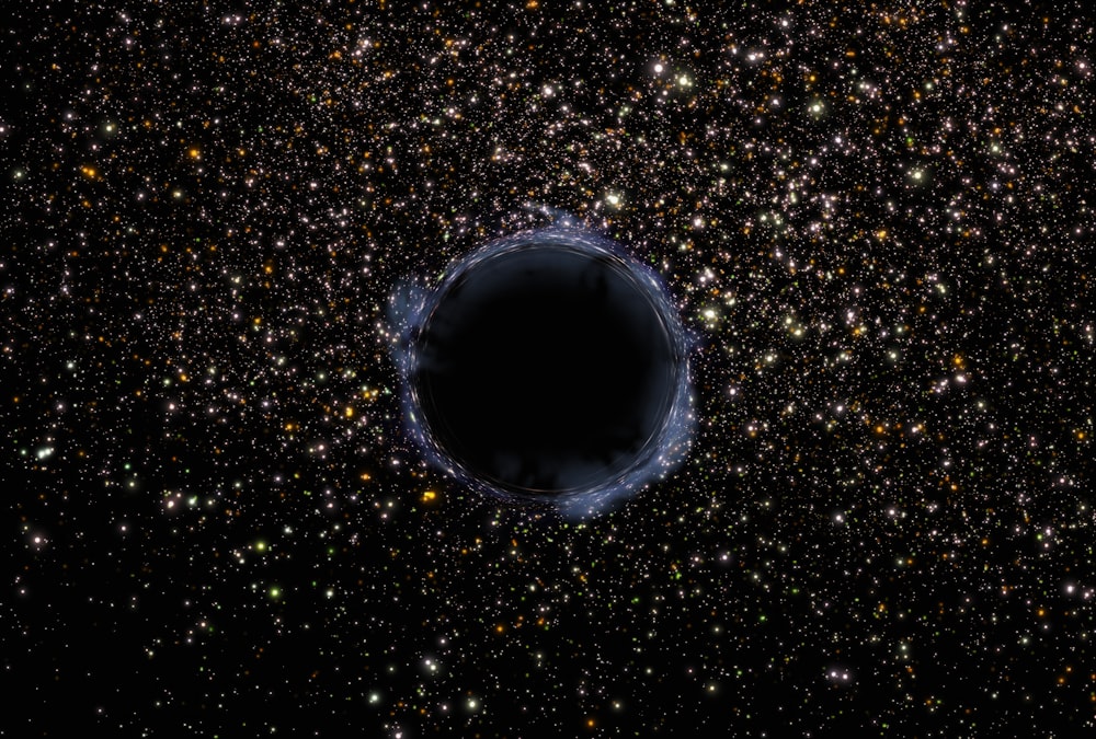 a black hole in the middle of a star filled sky
