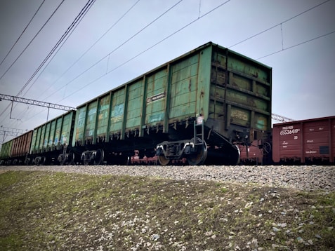 a train car sitting on top of a train track