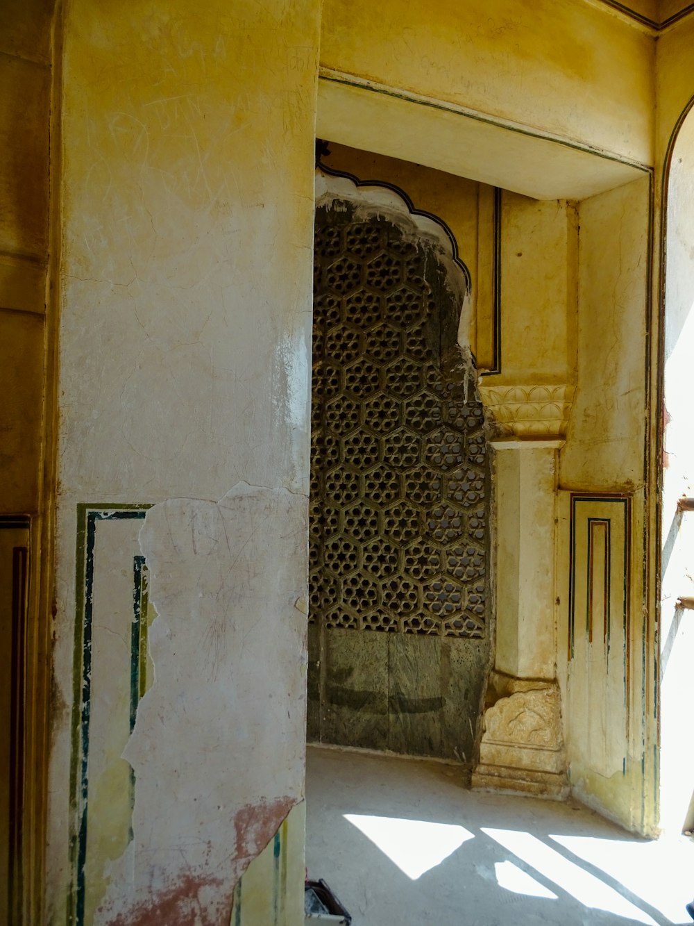 a doorway in a building with a clock on the wall