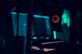a computer desk with a keyboard and a monitor