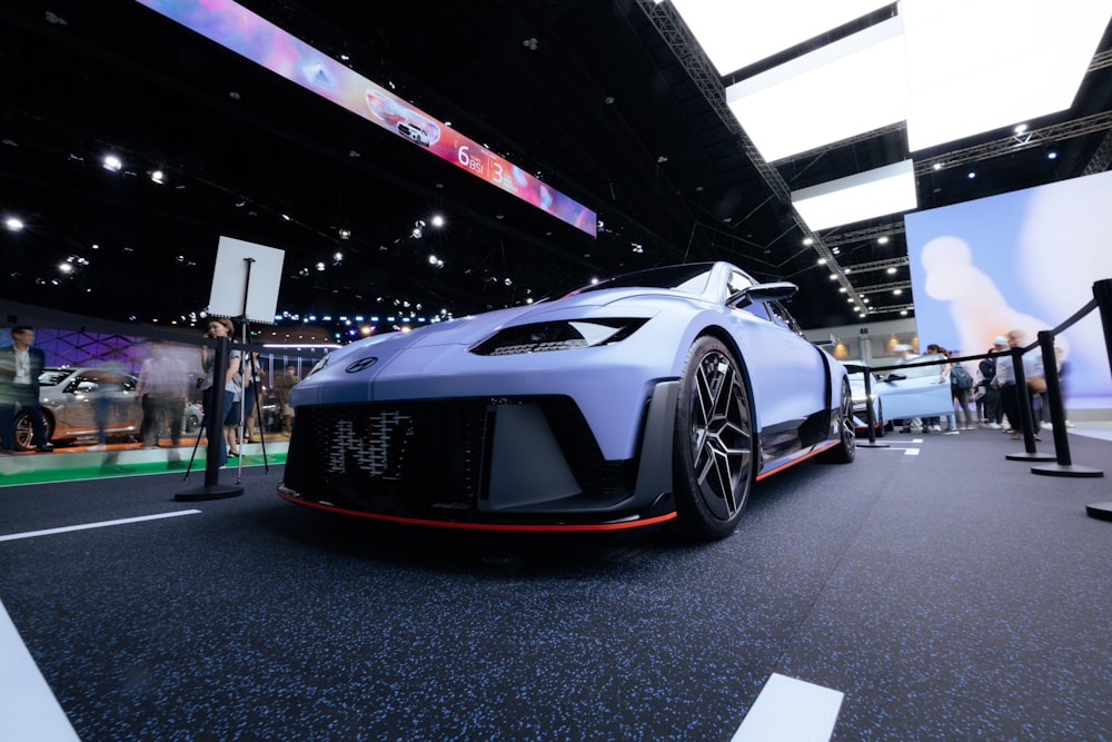 a sports car on display at a car show