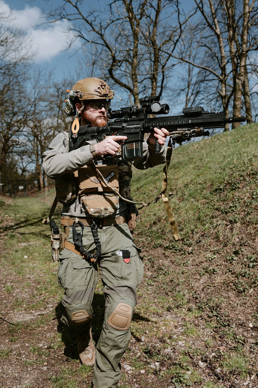 a man with a gun in his hand