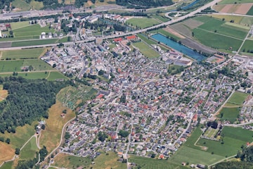 an aerial view of a city with lots of trees