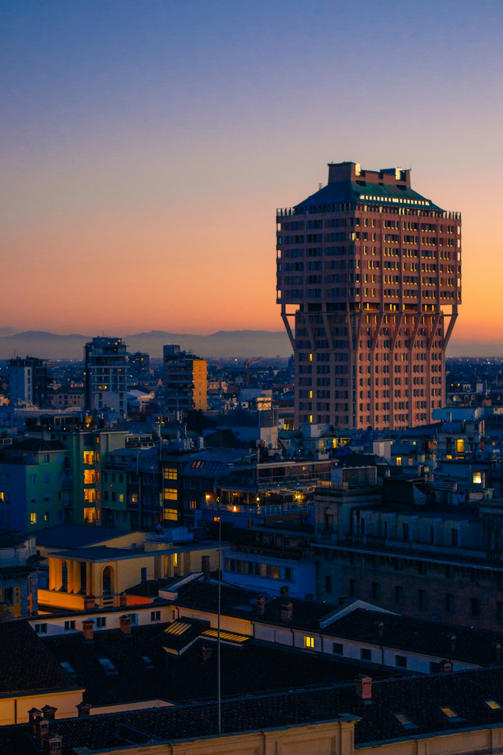 a view of a city at night from a tall building