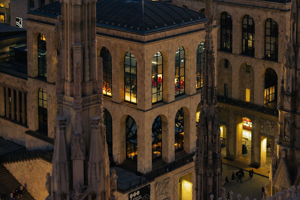 an aerial view of a large building at night