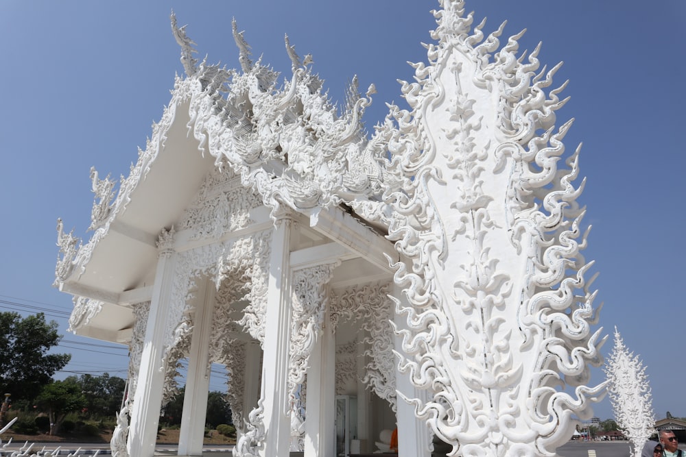 a large white structure with intricate designs on it