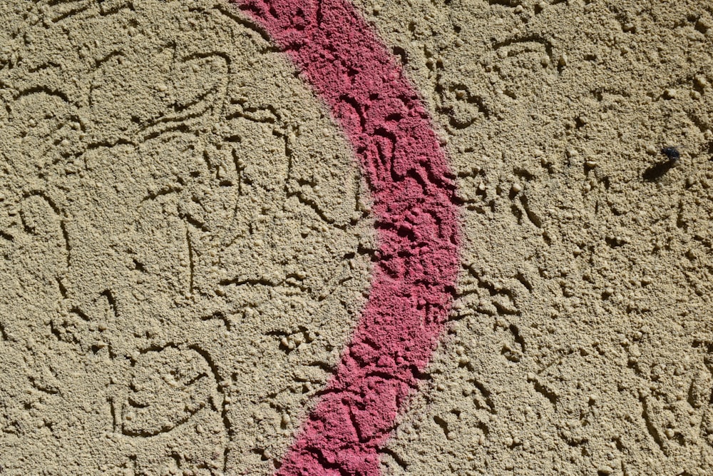 a close up of a wall with writing on it