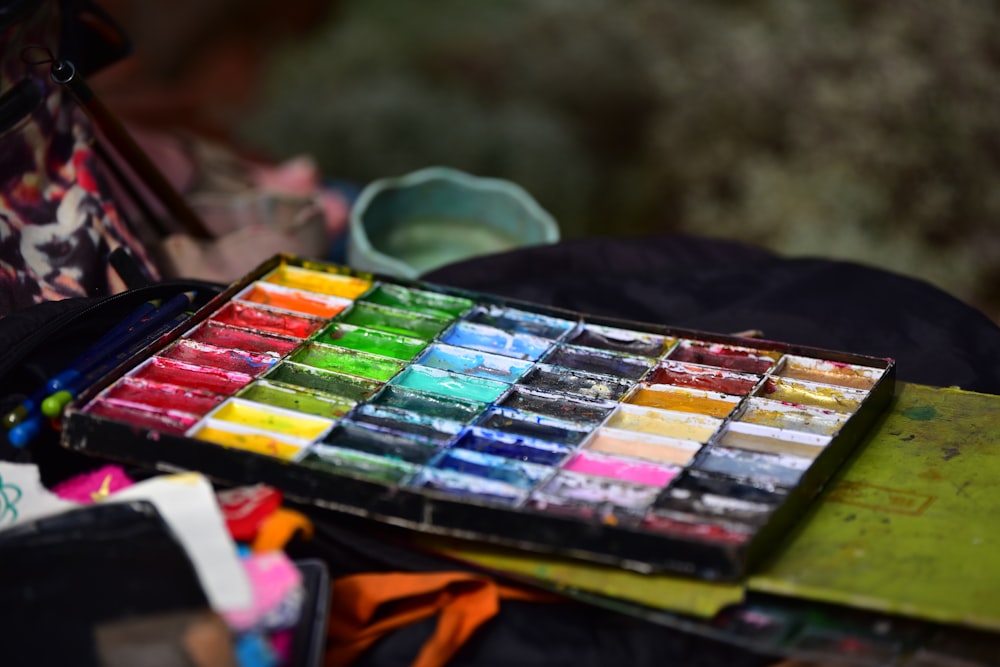 a box of paint sitting on top of a table