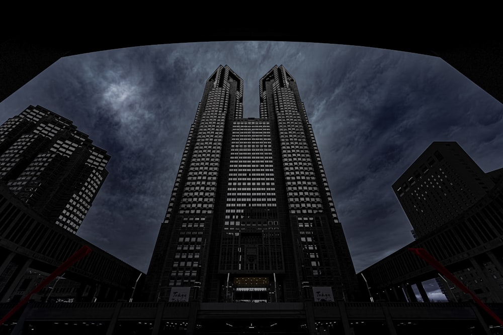 a very tall building with a sky background