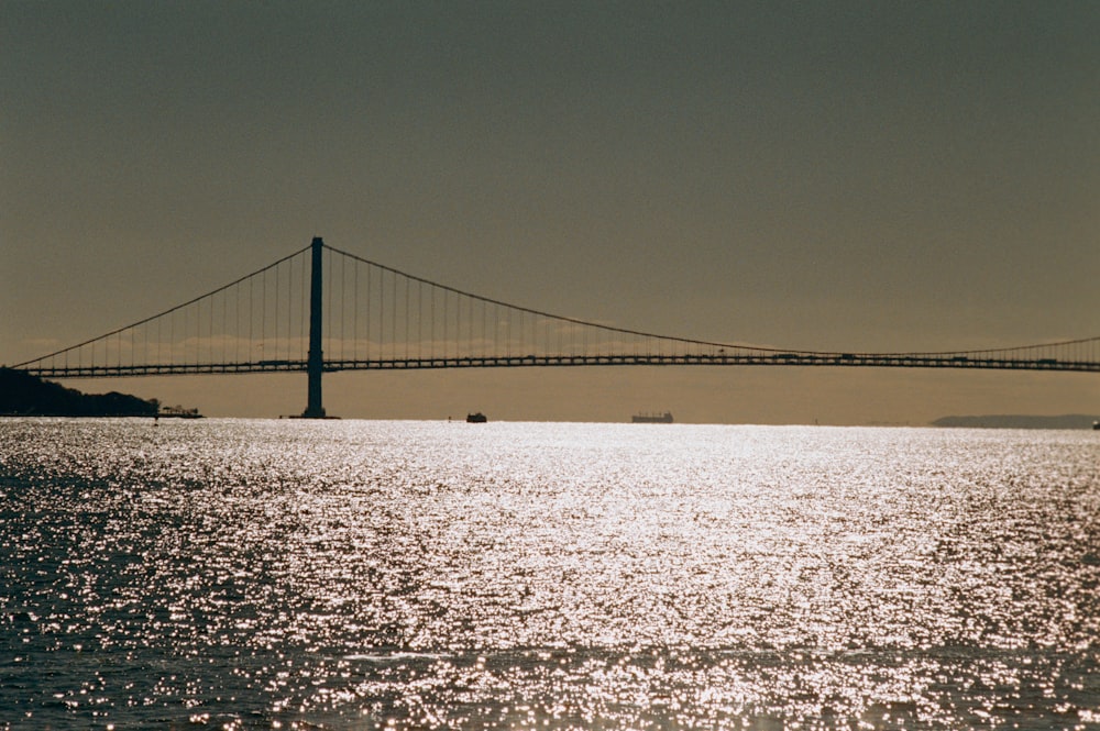 a large bridge spanning over a large body of water