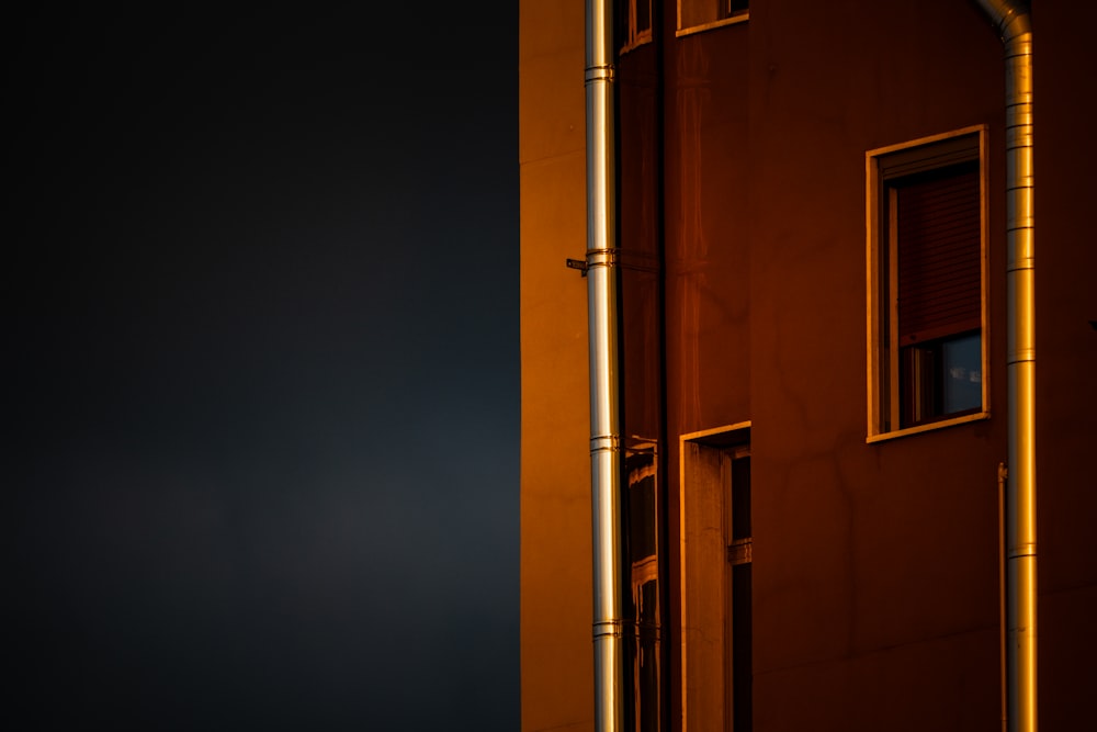 a tall building with a clock on the side of it