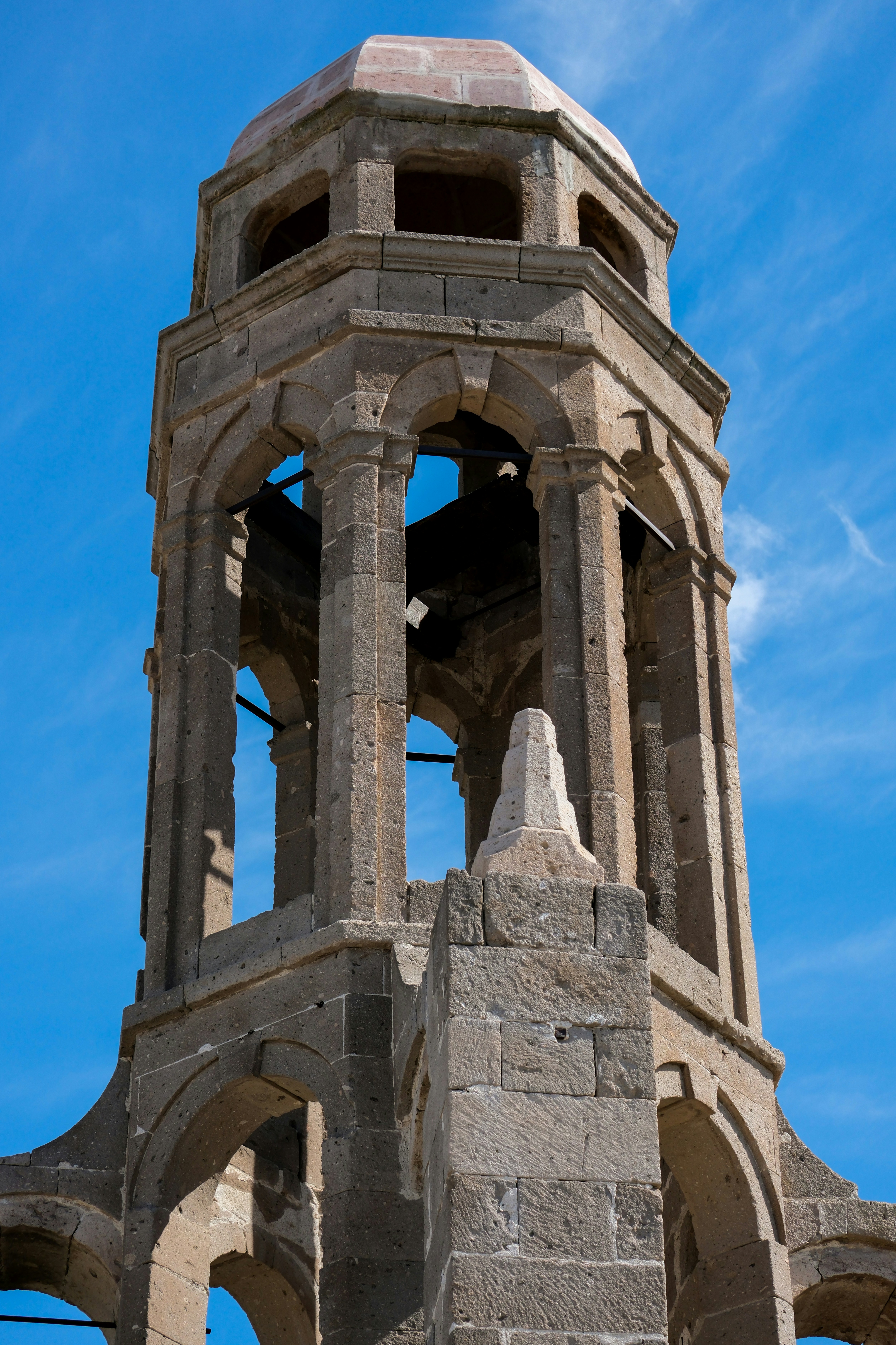 a very tall tower with a clock on it's side - a-very-tall-tower-with-a-clock-on-its-side-JOZXlfir6-A