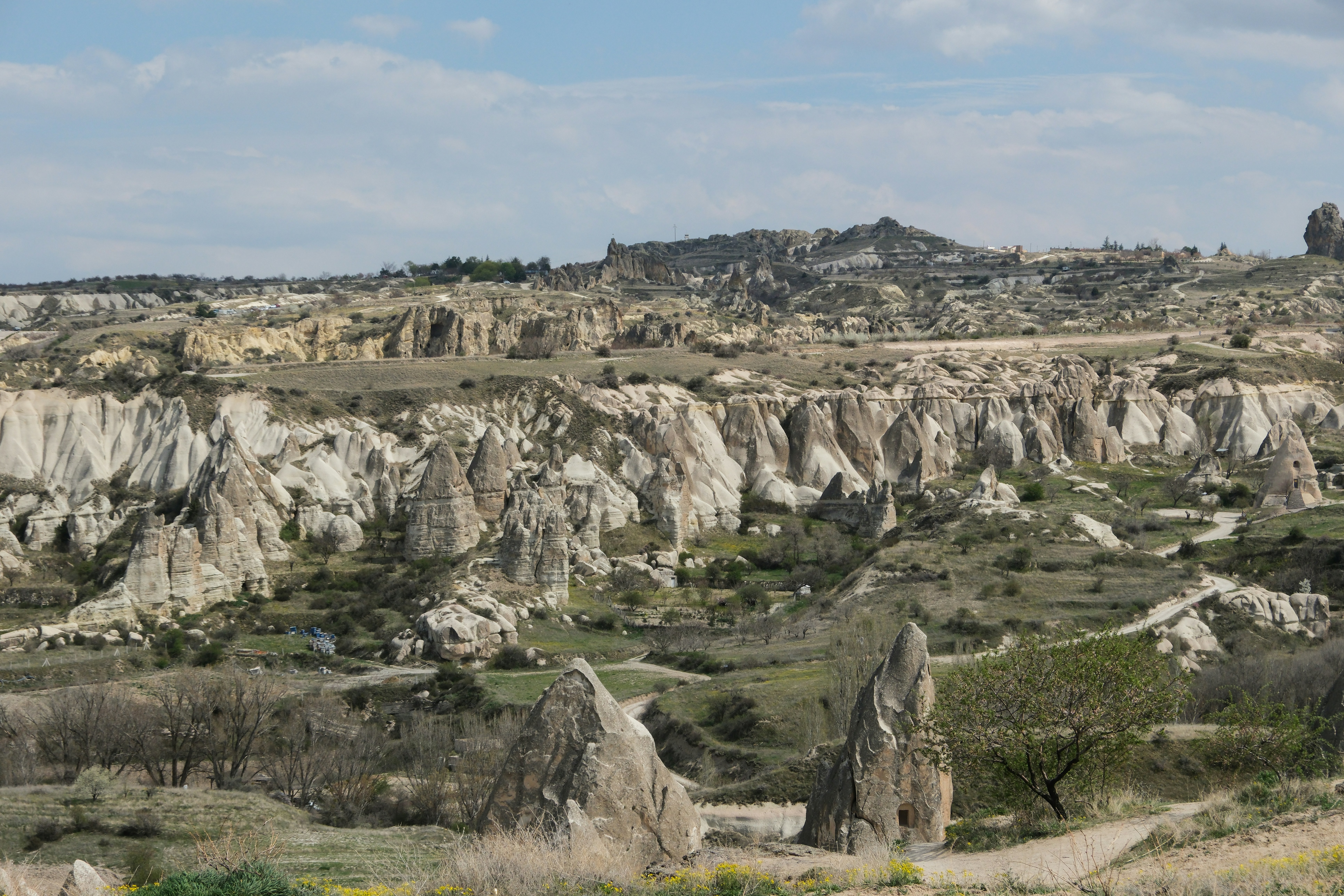 a view of a rocky landscape from a distance - a-view-of-a-rocky-landscape-from-a-distance-VdY8Y22Dp1k