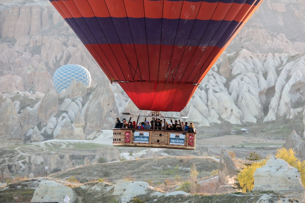a group of people riding in a hot air balloon
