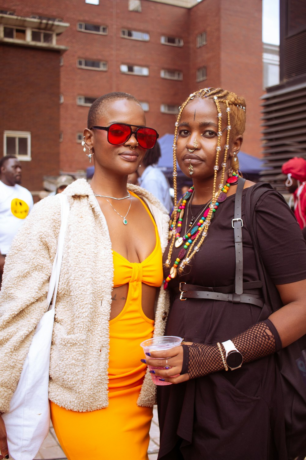 a couple of women standing next to each other