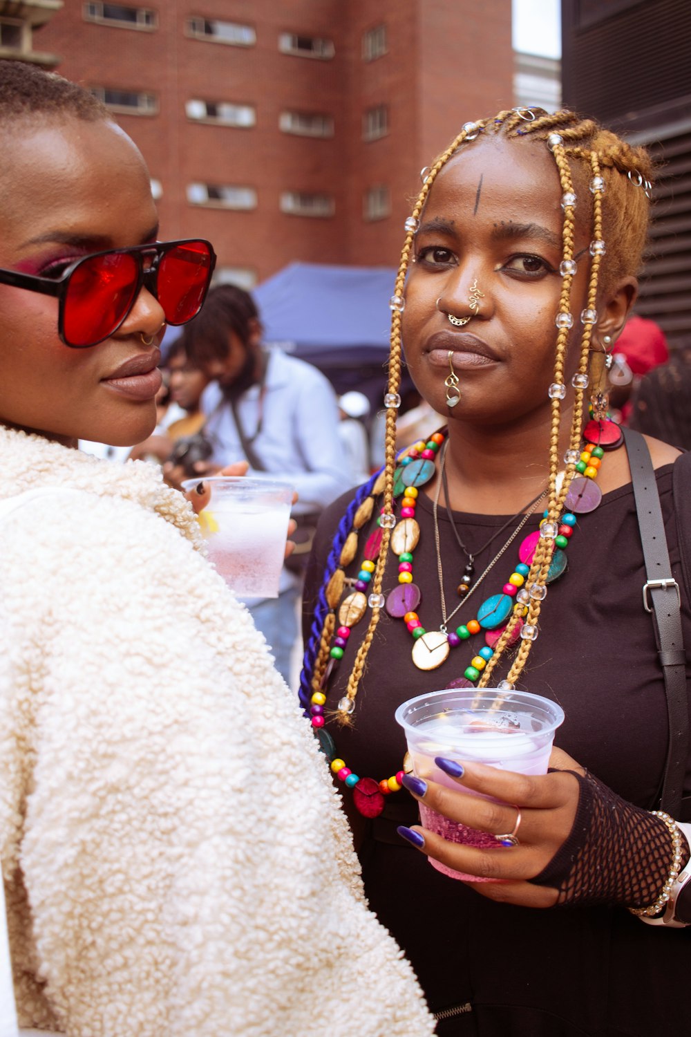 a couple of women standing next to each other