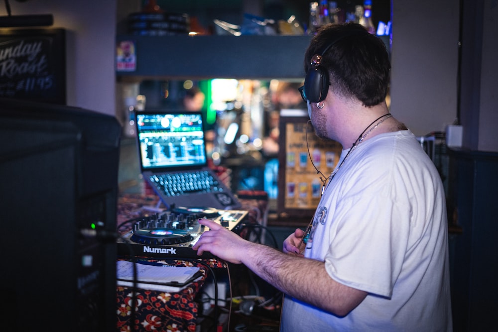 a man in a recording studio with headphones on