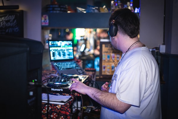 Engineer monitoring audio levels in a studio