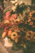 a bunch of flowers that are in vases