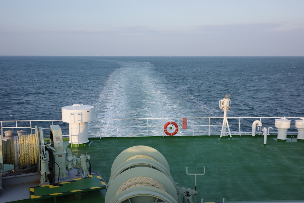 a boat traveling across a large body of water