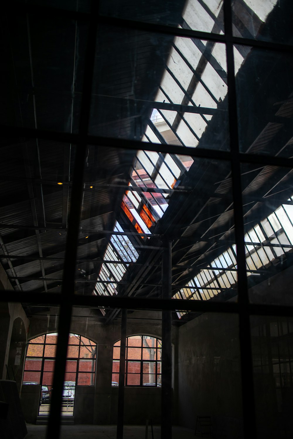 a view of a building through a glass window