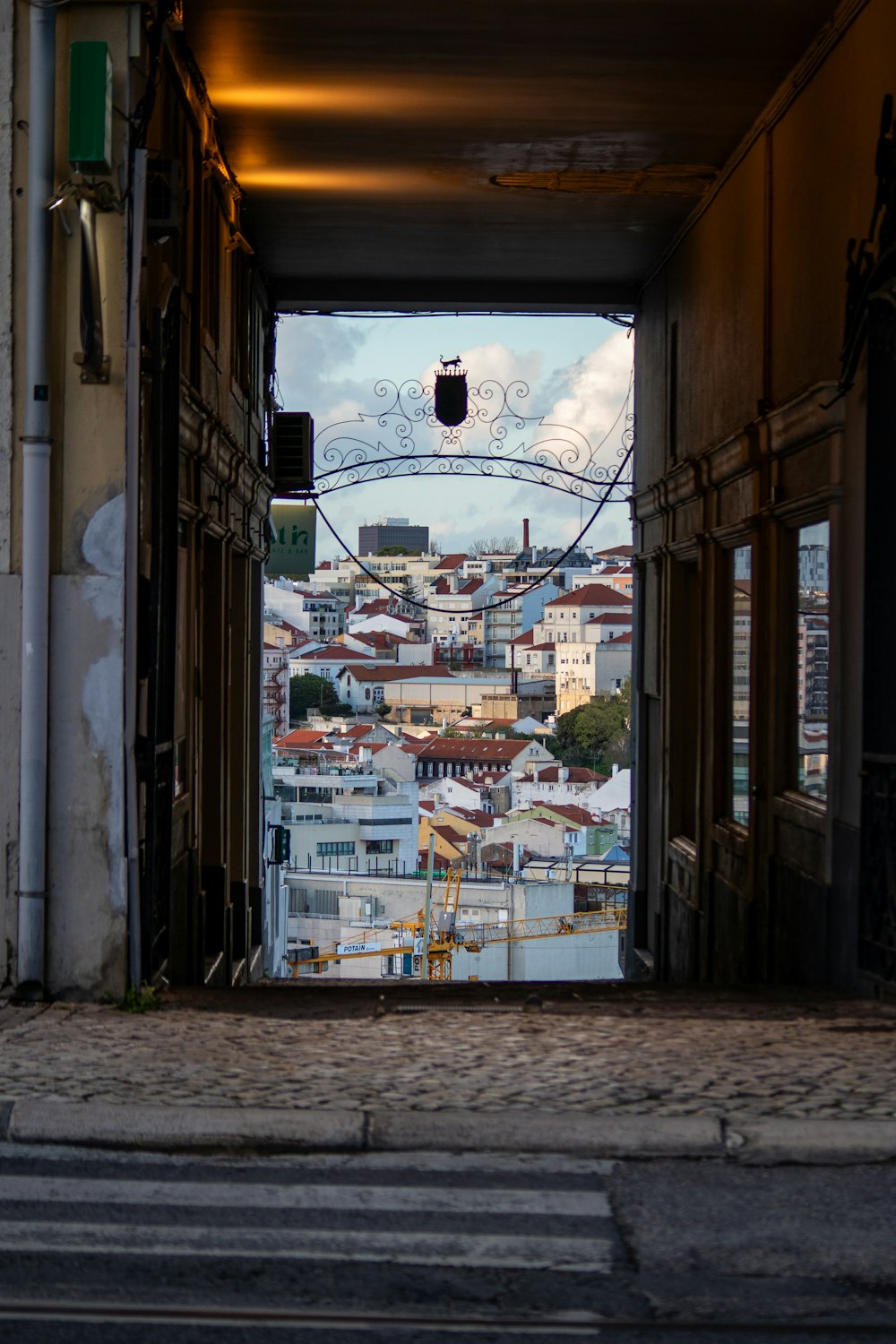 a view of a city through an open door