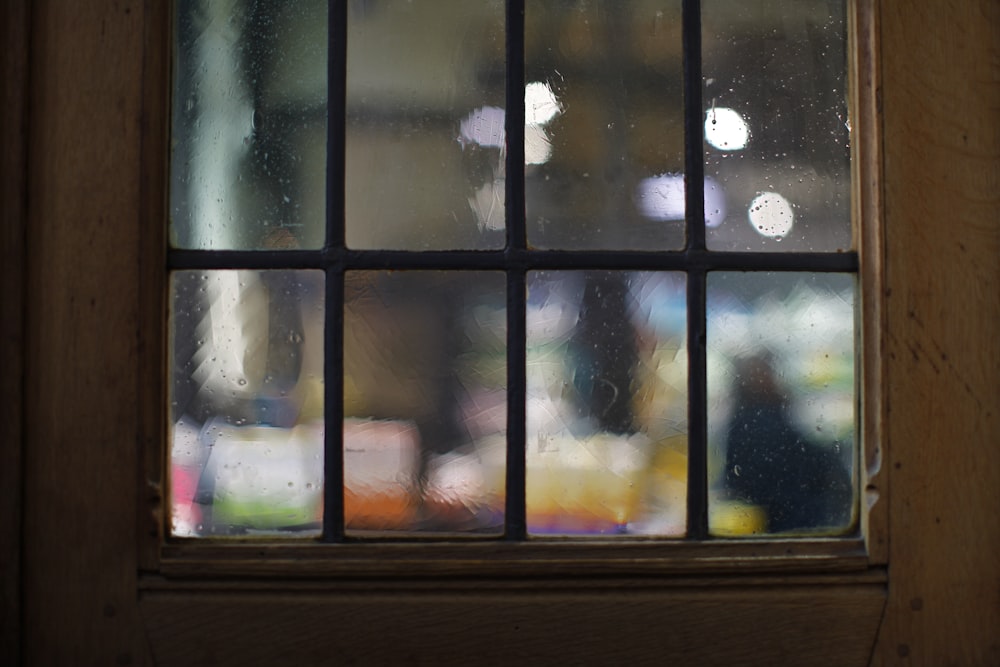 a close up of a window with rain coming in