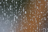 a window with rain drops on it
