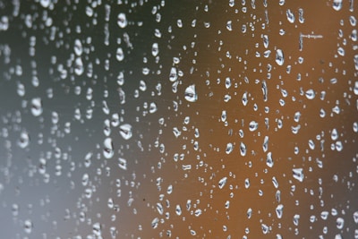 a window with rain drops on it