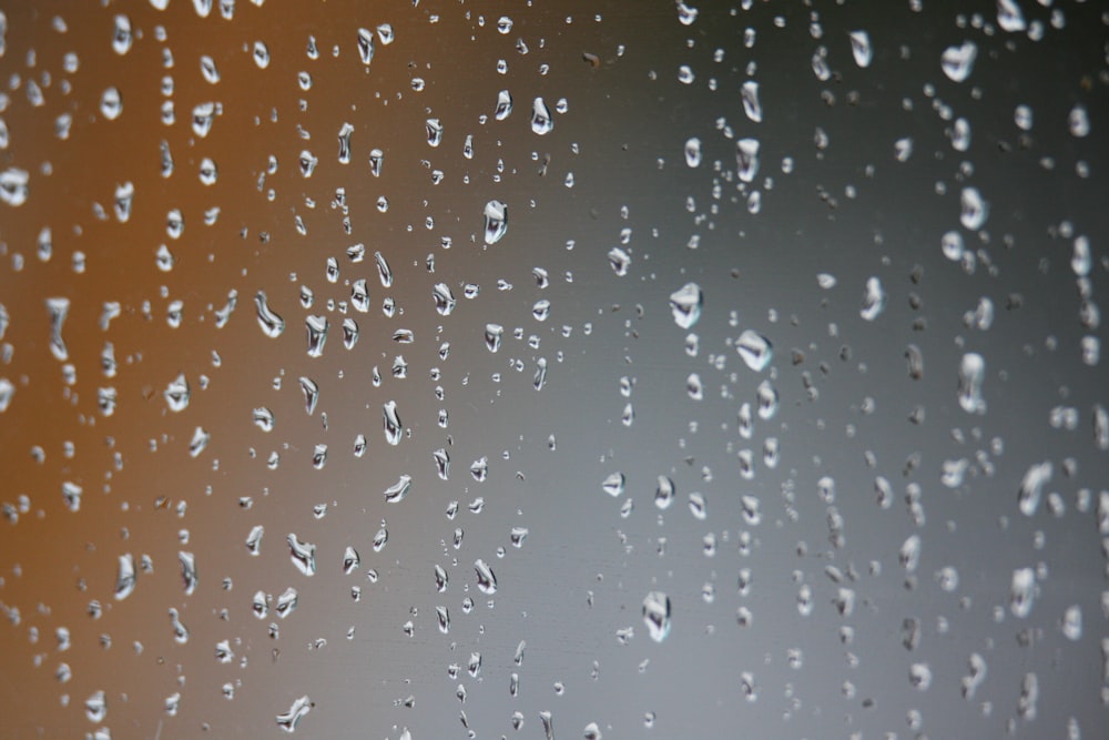 a close up of water droplets on a window