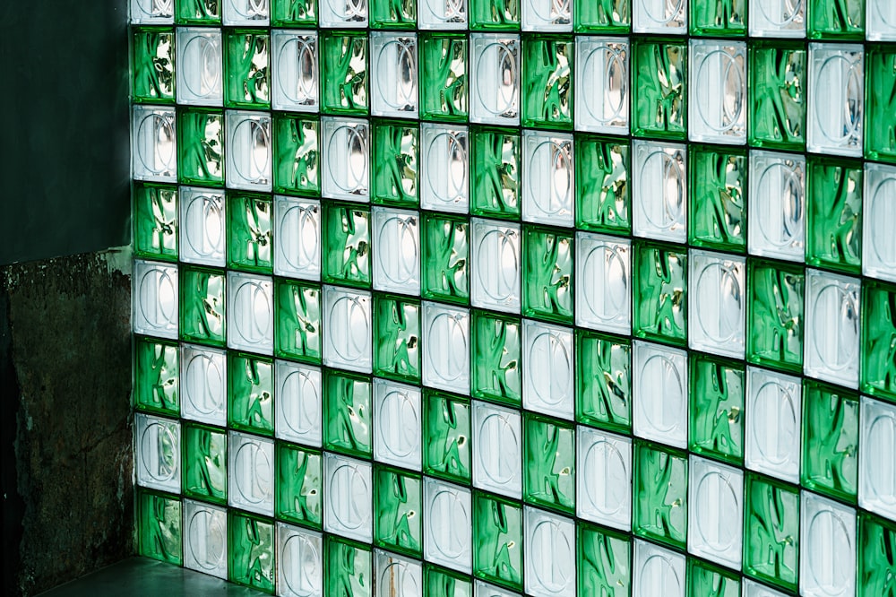 a wall made up of green glass blocks