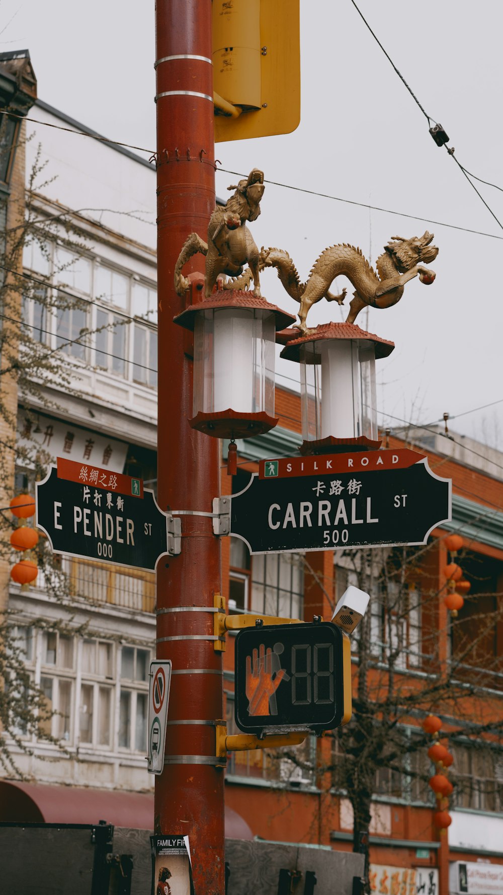 a pole with a bunch of street signs on it