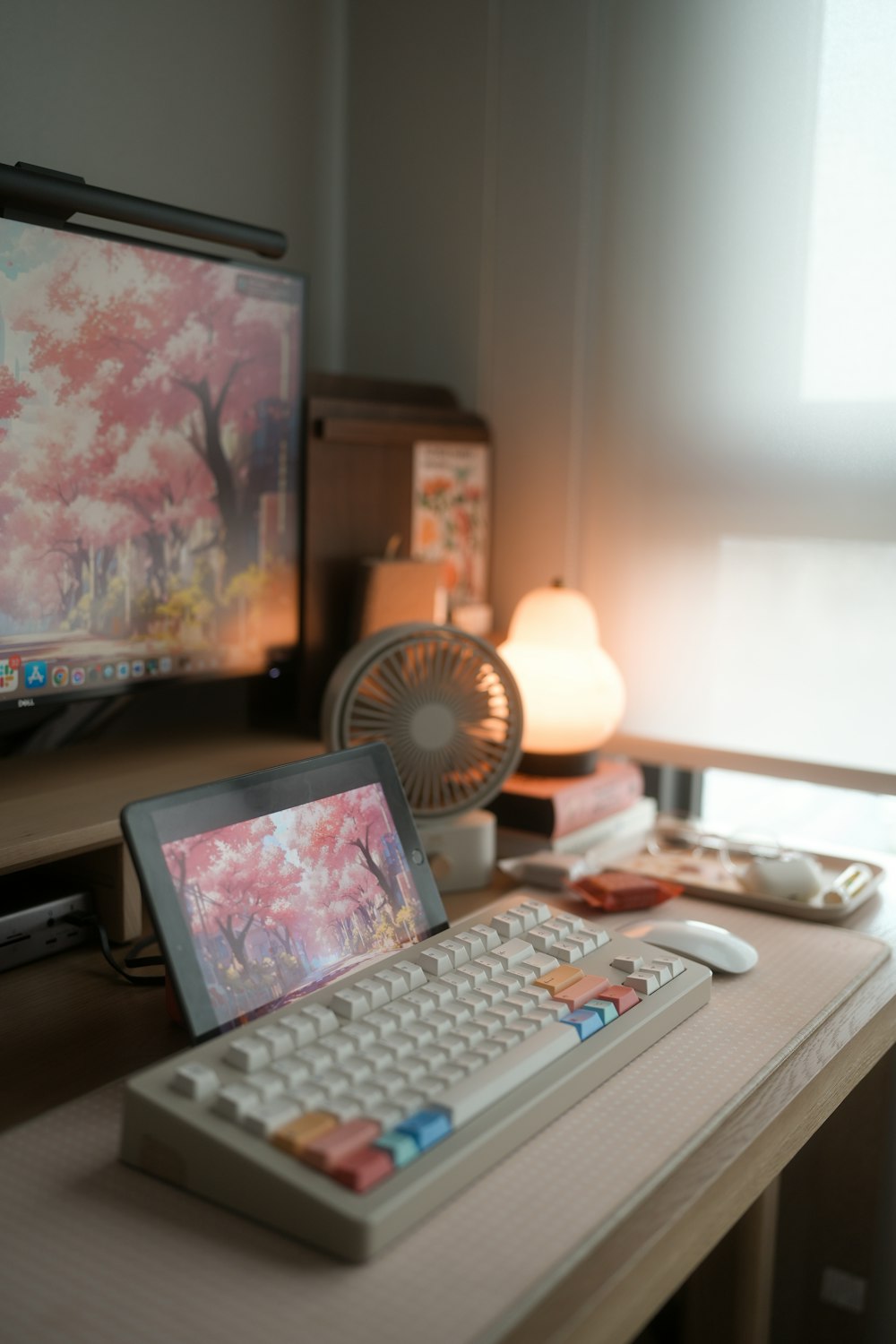 a laptop computer sitting on top of a wooden desk