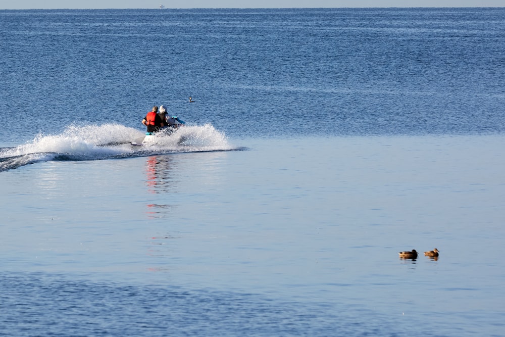 a person on a jet ski in the water