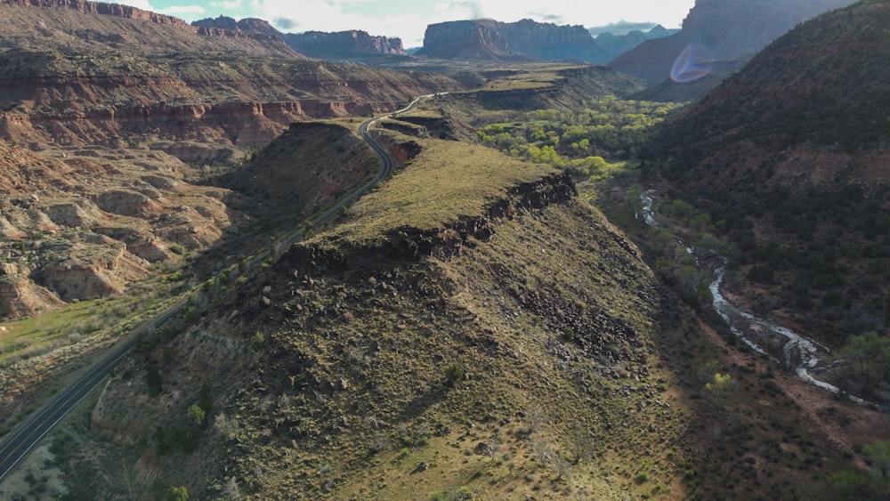 an aerial view of a canyon with a river running through it