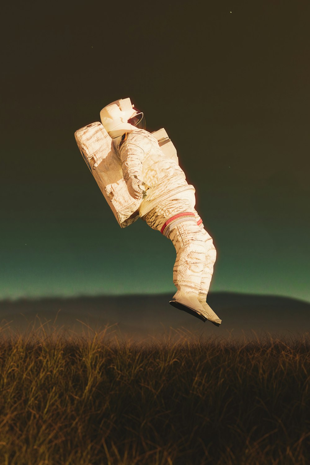 a man in a space suit flying through the air