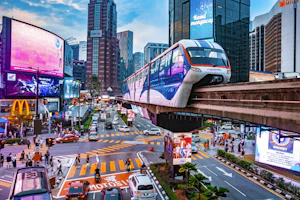 A busy city street lined with tall buildings