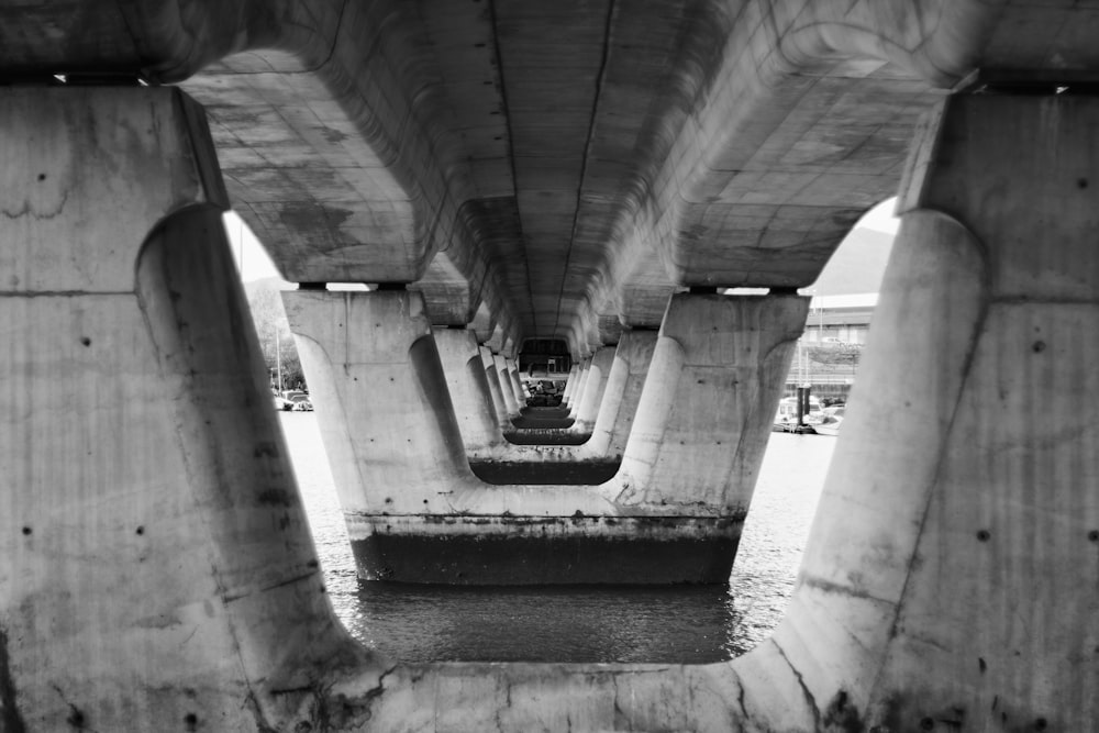 a black and white photo of a bridge