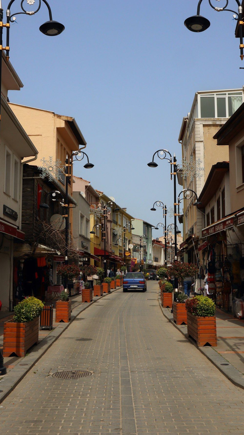 a car is driving down an empty street