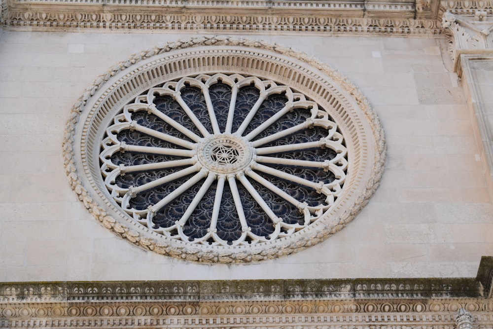 a large circular window on the side of a building