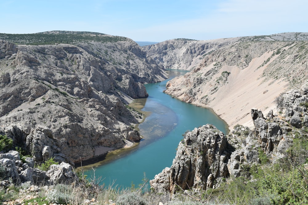 a large body of water surrounded by mountains