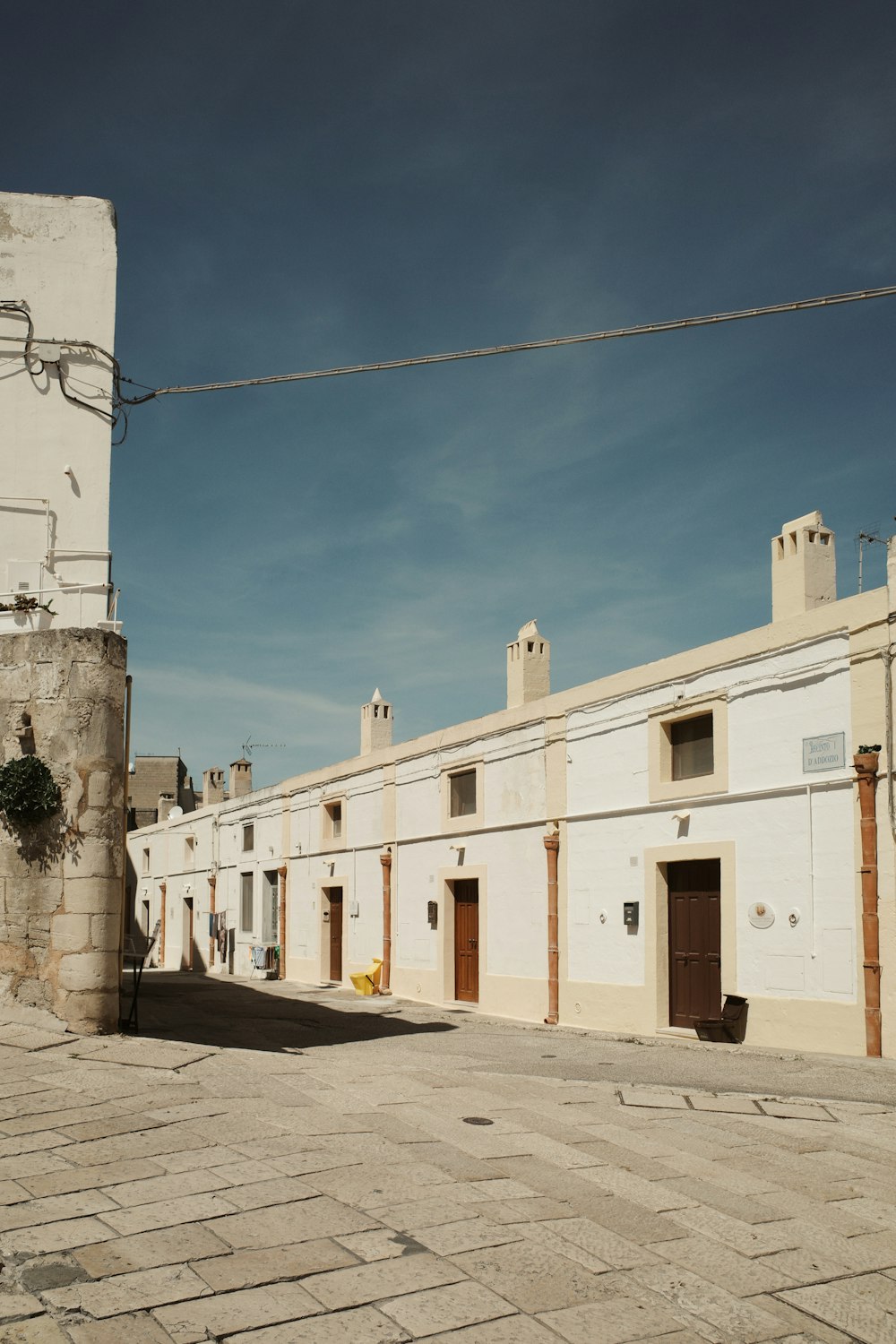 a row of white buildings sitting next to each other