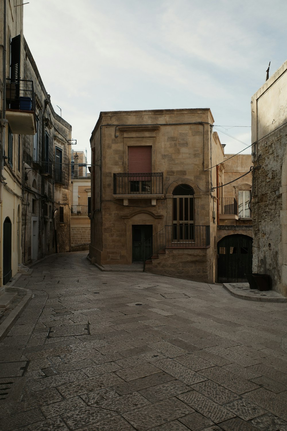 an empty street in an old city with no people