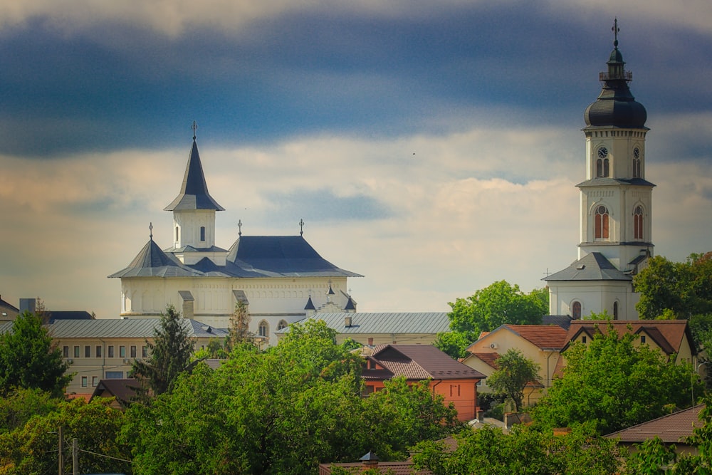 a view of a city with a church in the background