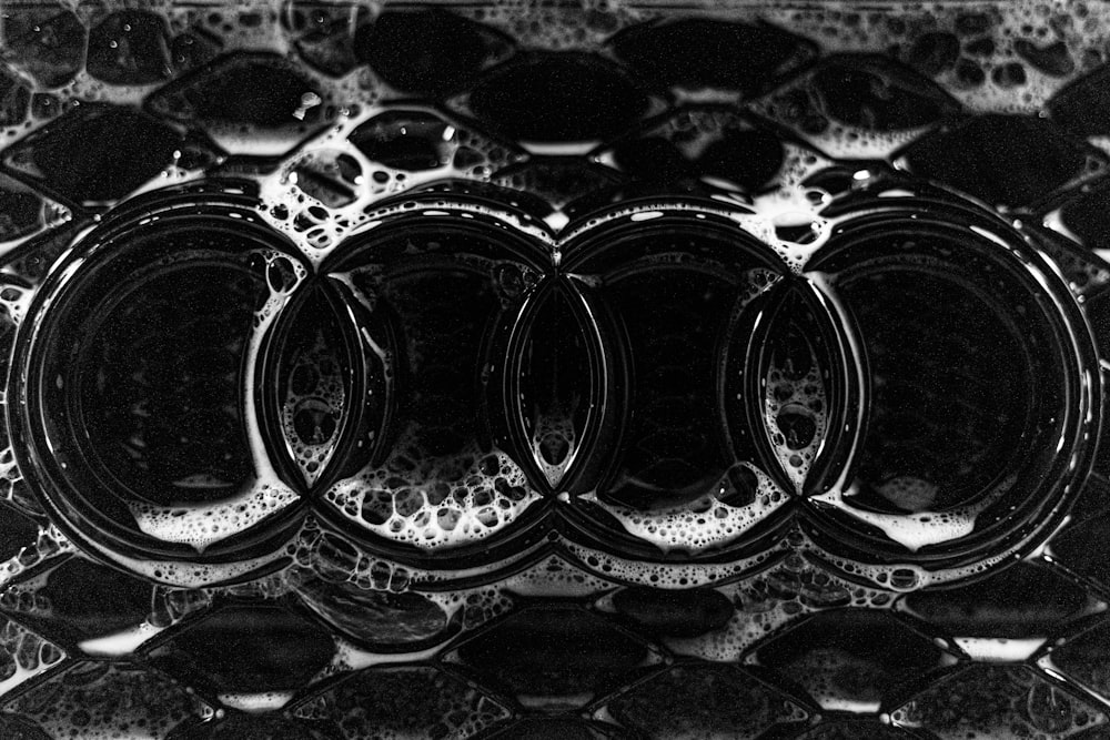 a black and white photo of water bubbles