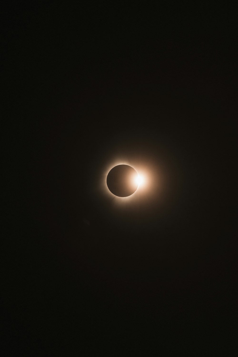 a solar eclipse in the dark sky